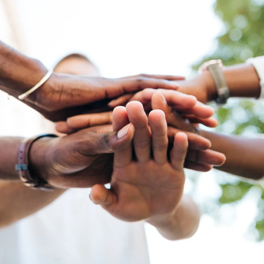 Hands stacked in partnership