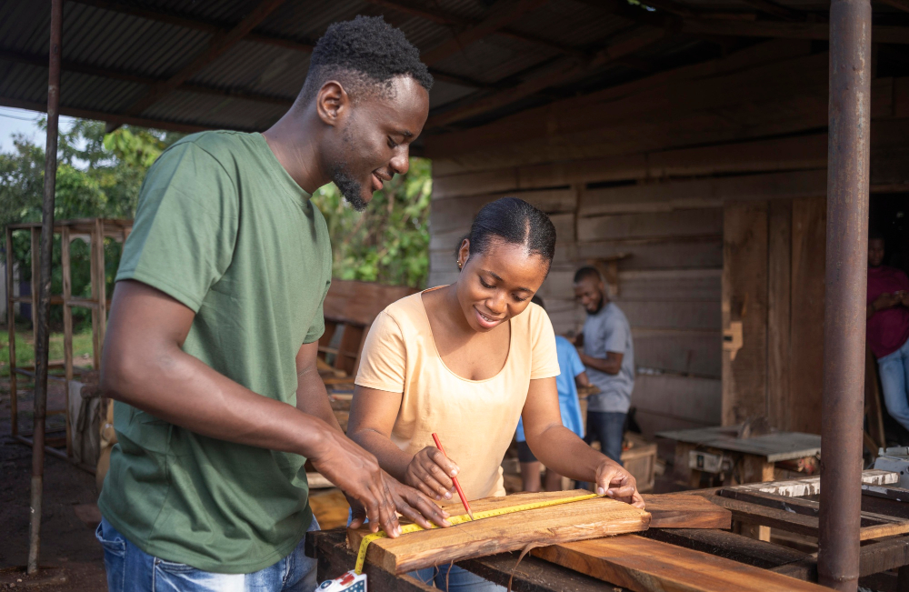 Young entrepreneurs learning pottery skills together